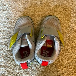 Toddler shoes in hood shape and ready to play.